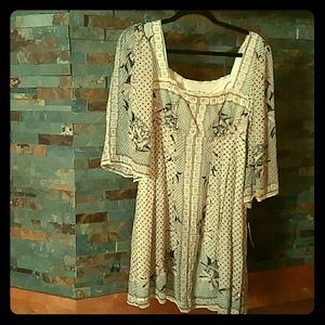 Cream dress with ornate detail